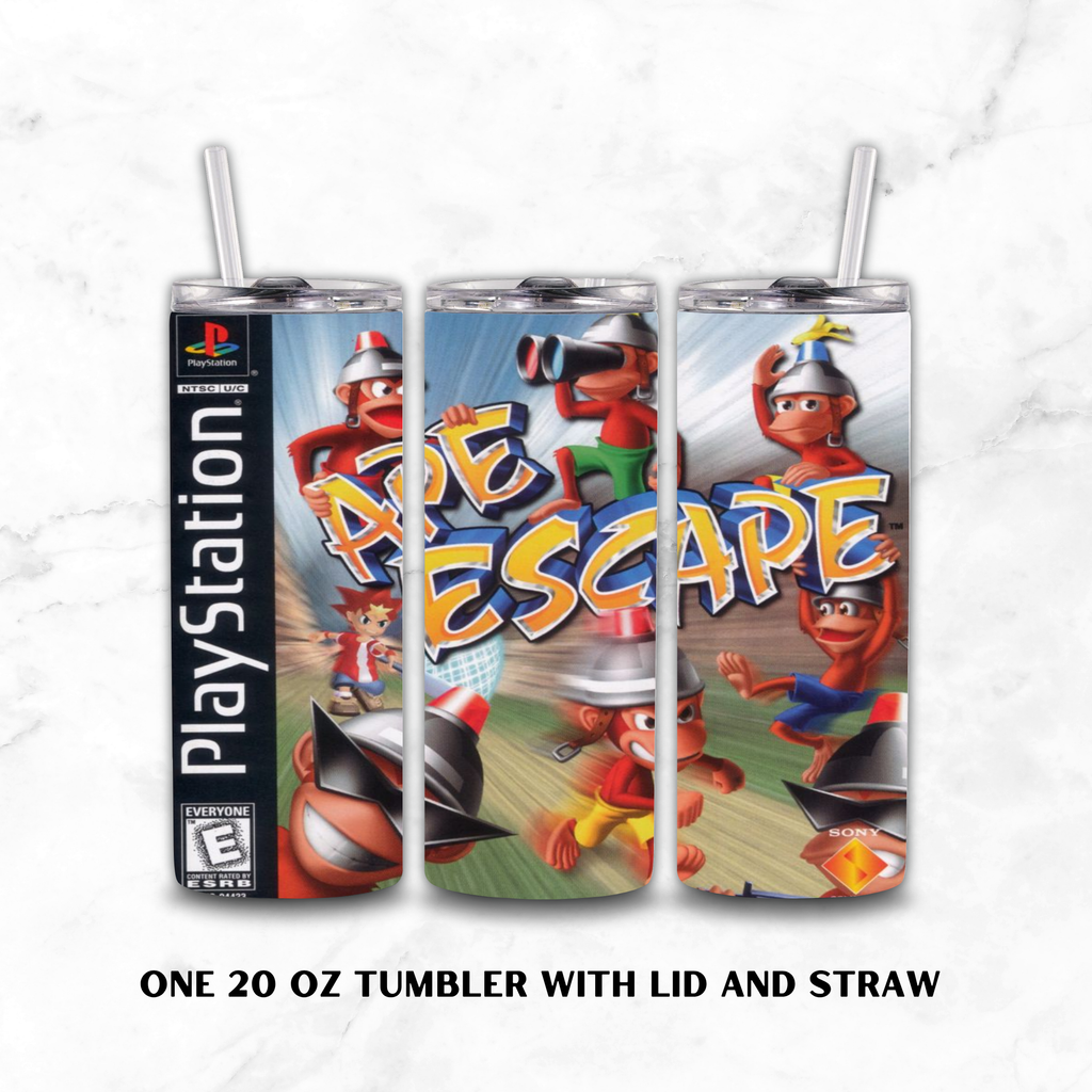 Three views of a 20 oz stainless-steel tumbler with lid and straw, featuring a wrap-around PlayStation 'Ape Escape' video game cover design on a white marble background.