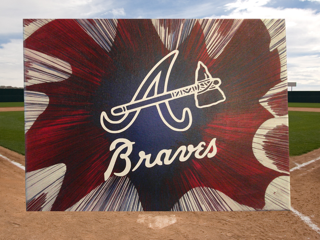 Atlanta Braves Spin Art canvas wall art with a baseball field in the background.