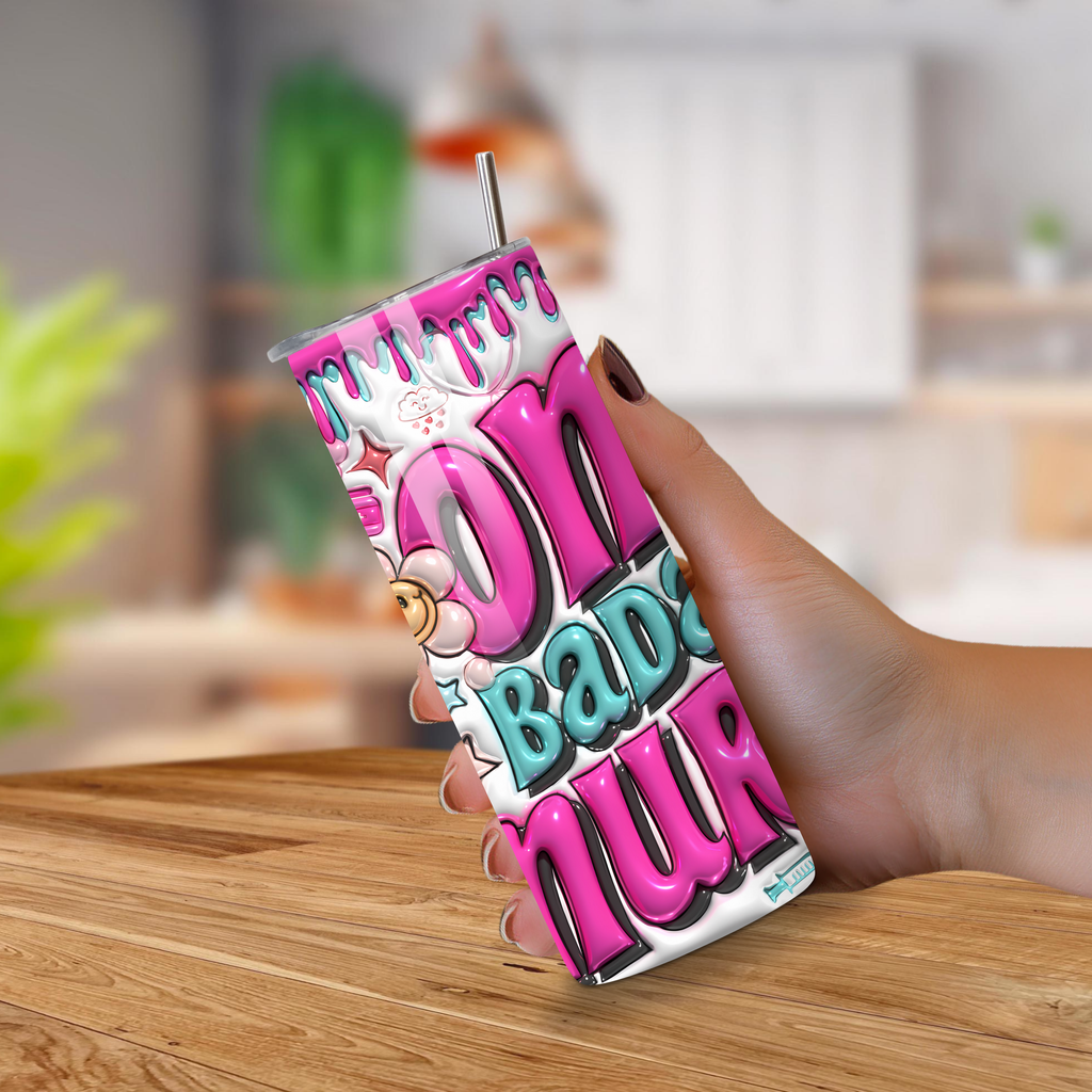 Colorful tumbler with text held by a hand on a wooden surface