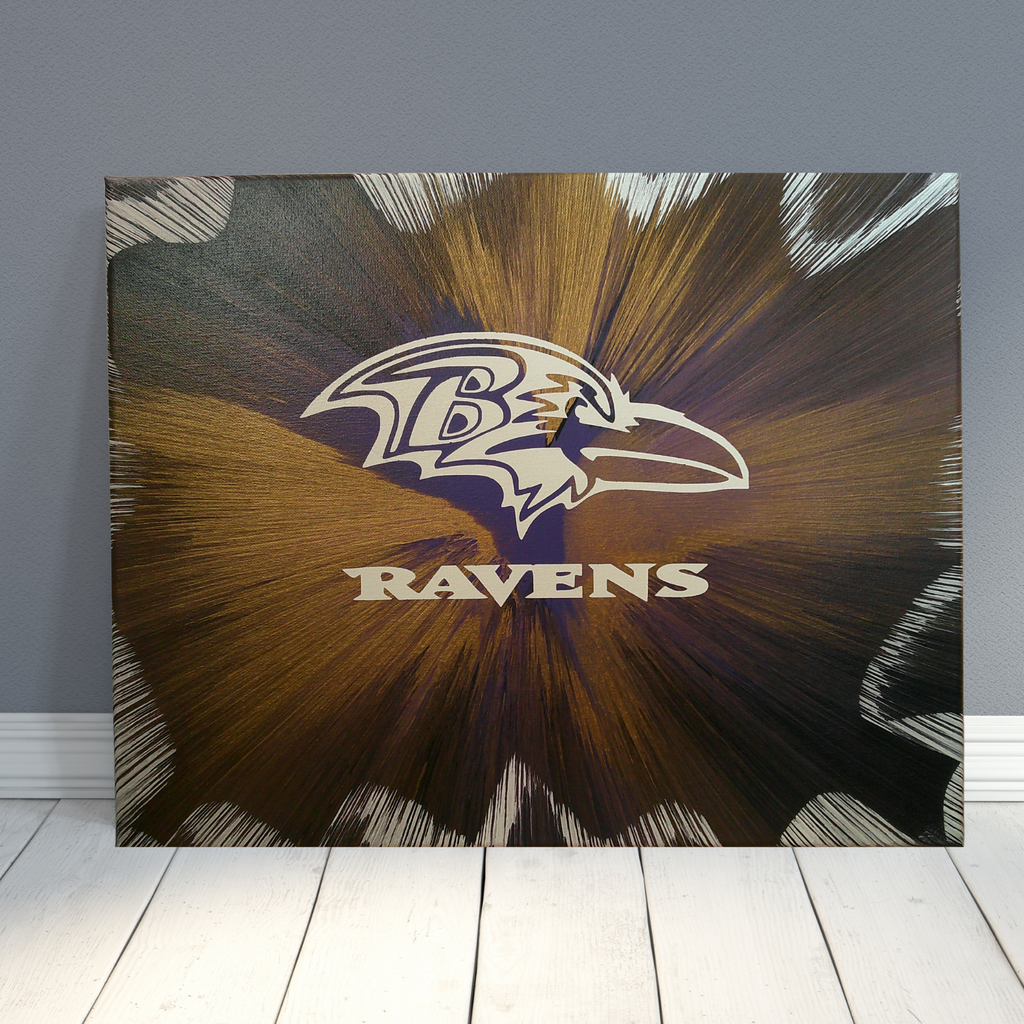 Baltimore Ravens logo on a spin art canvas with sunburst design against a gray wall.