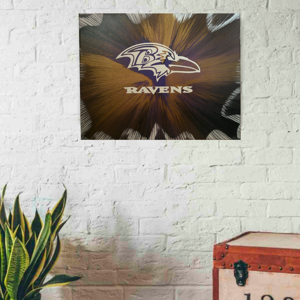 Baltimore Ravens Spin Art on a white wall with a plant and trunk in the foreground
