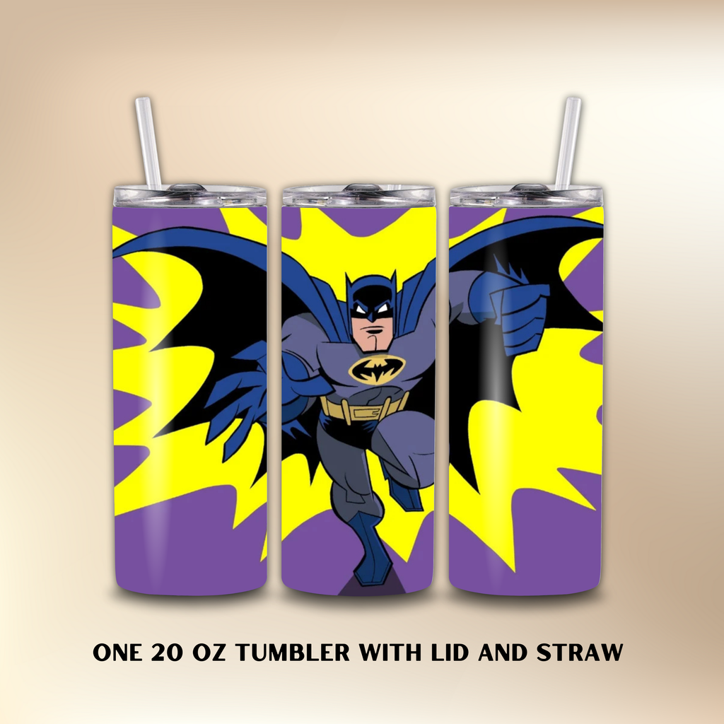 Three Batman-themed tumblers with lids and straws on a beige background.