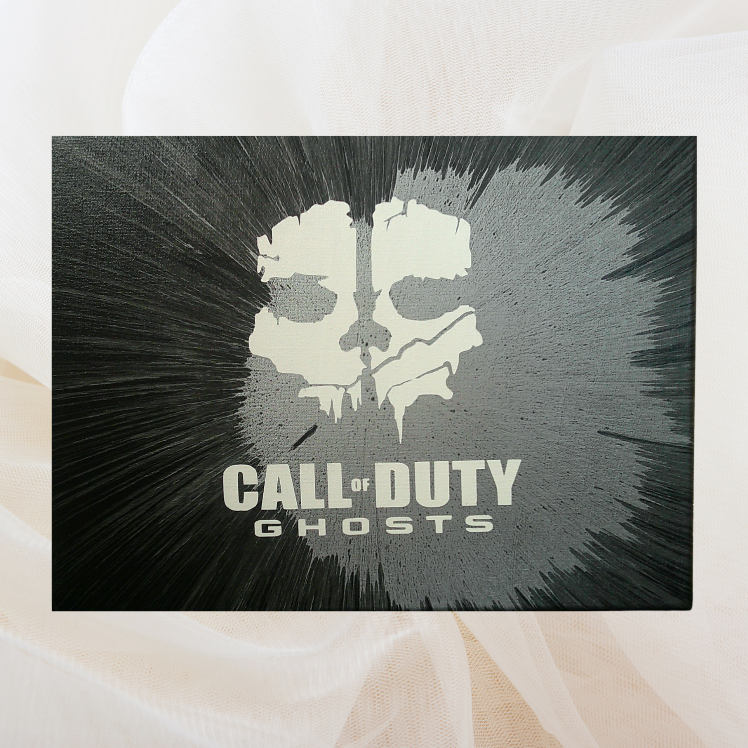 Call of Duty spin art canvas on a beige background
