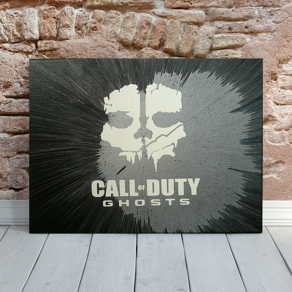 Call of Duty spin art canvas against a brick wall.