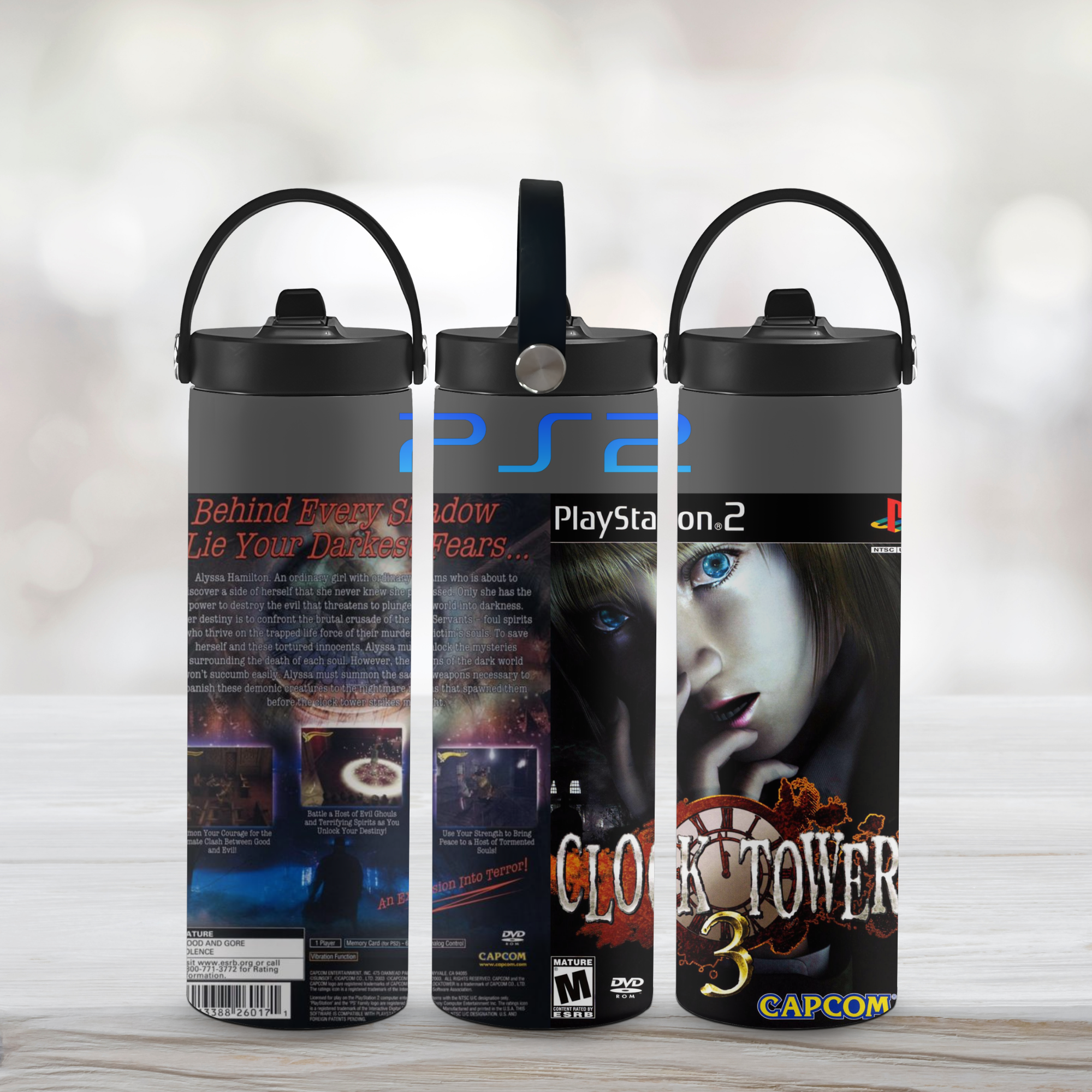 Three PlayStation 2 sports water bottles for 'Clock Tower 3' on a light wooden surface with a blurred background.