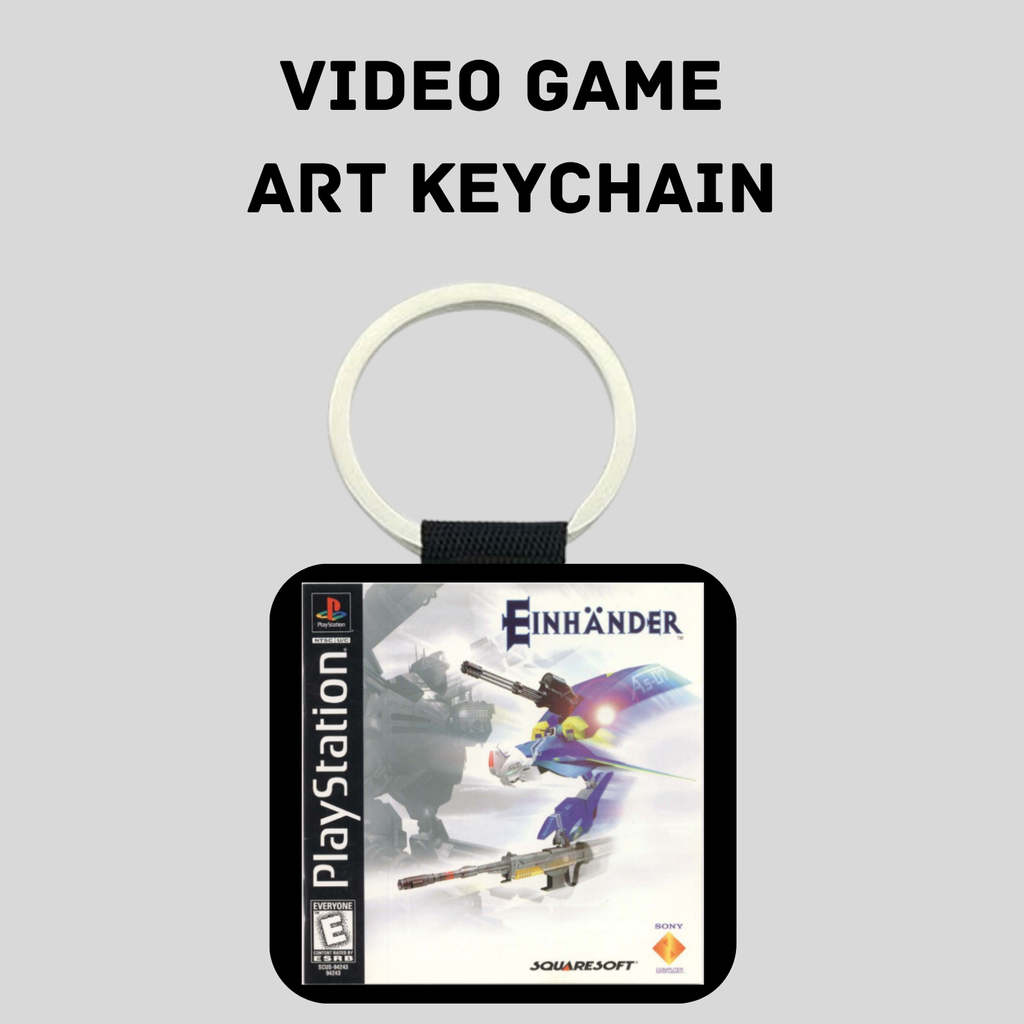 A PlayStation-themed video game art keychain featuring the cover art of the game 'Einhänder' on a black square pendant with a white key ring, shown against a light gray background with the text 'VIDEO GAME ART KEYCHAIN' above it.
