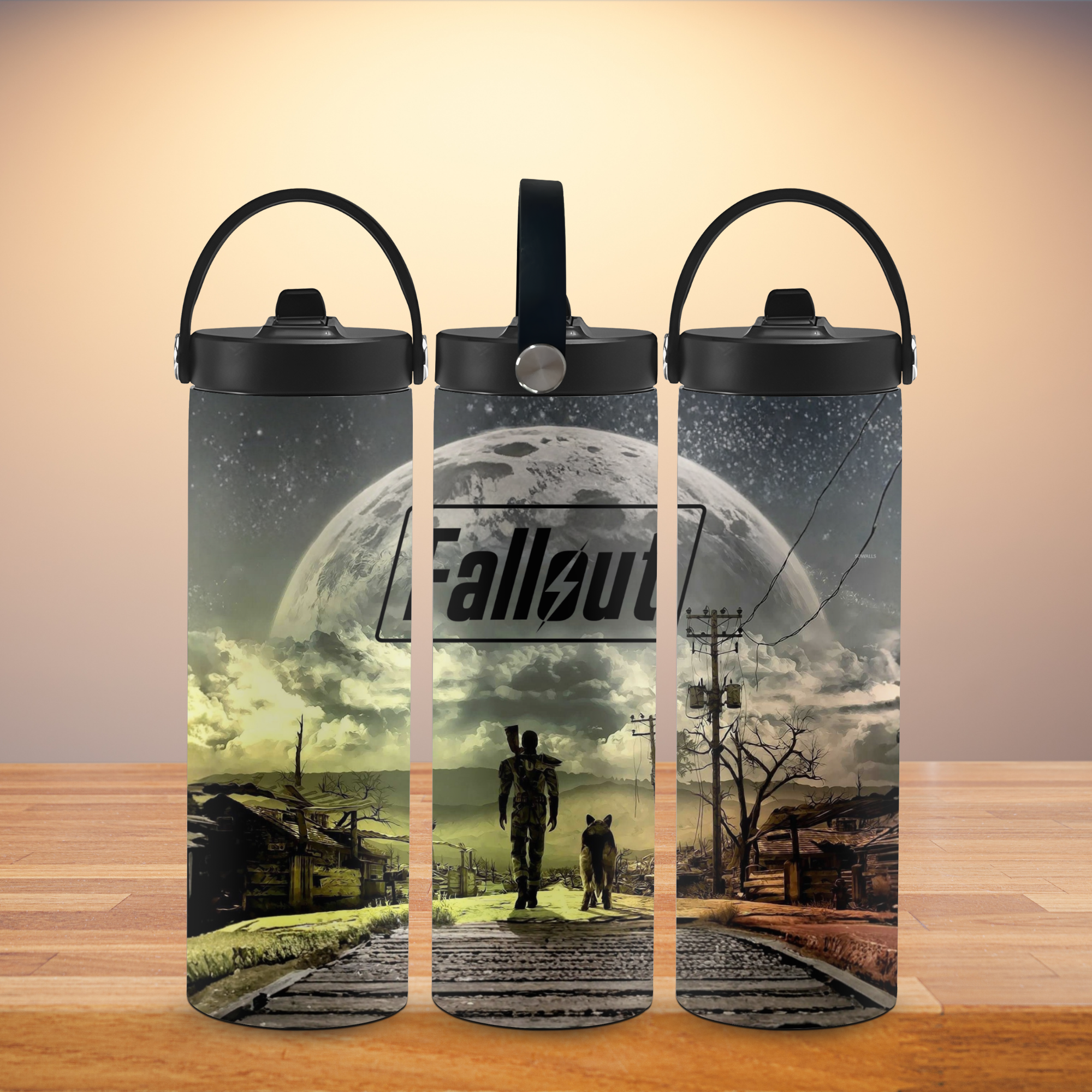 Three water bottle tumblers with 'Fallout' design on a wooden surface