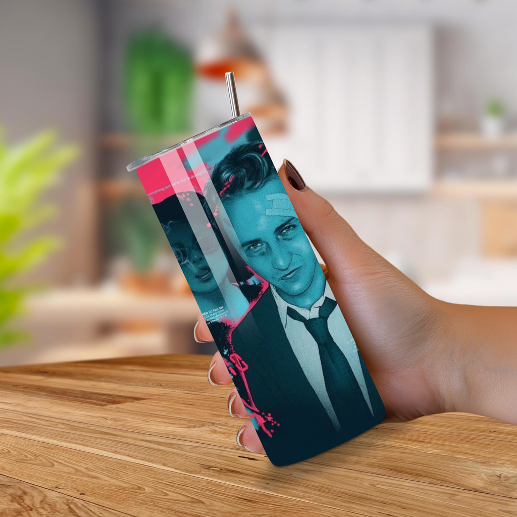 Person holding a tumbler with a graphic design of Fight Club on a wooden surface