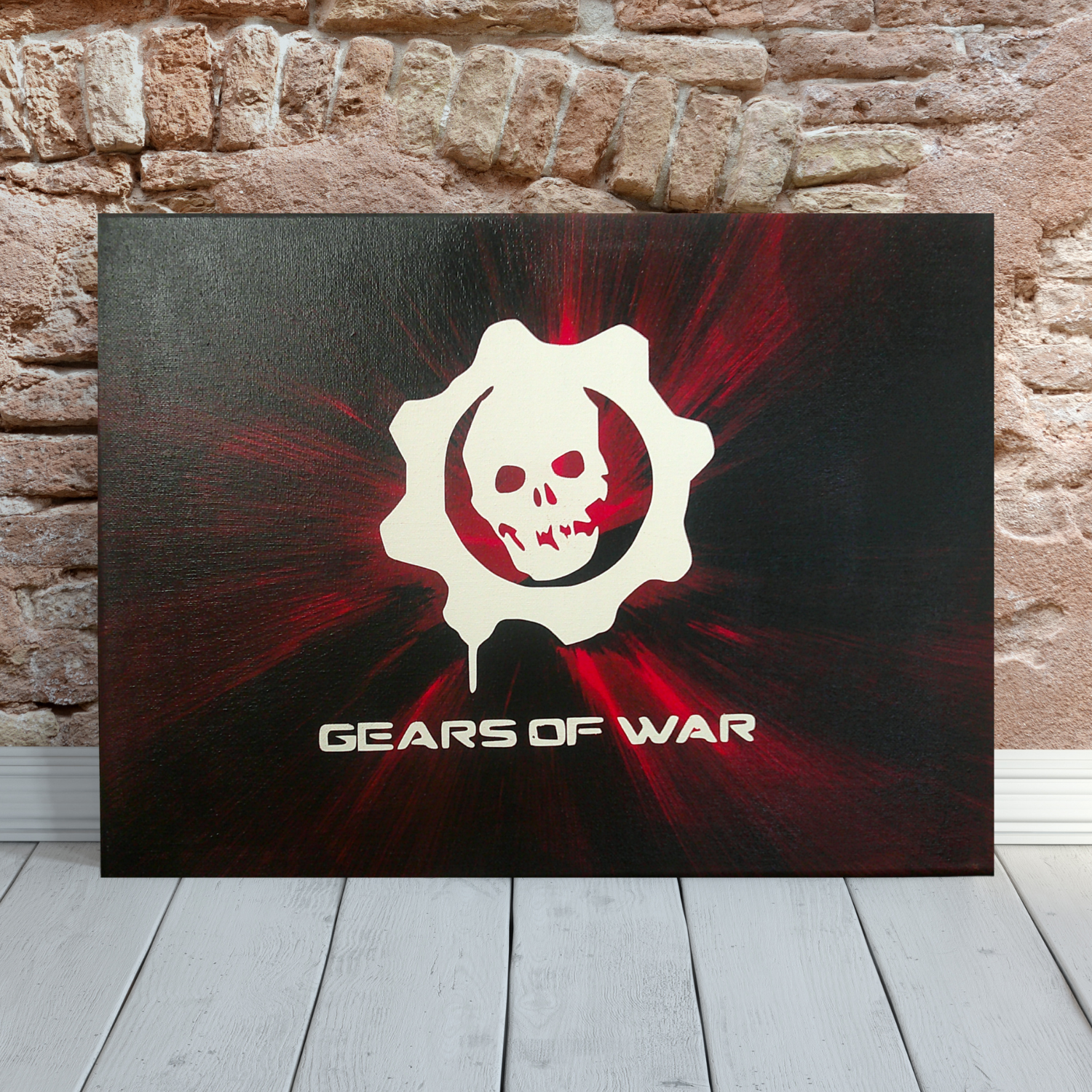 Gears of War spin art canvas against a brick wall.