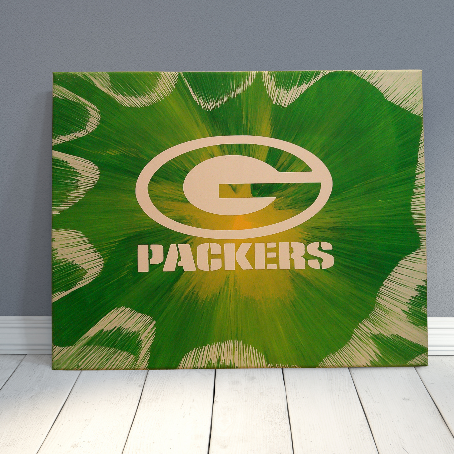Spin Art canvas with Green Bay Packers logo and textured wall background