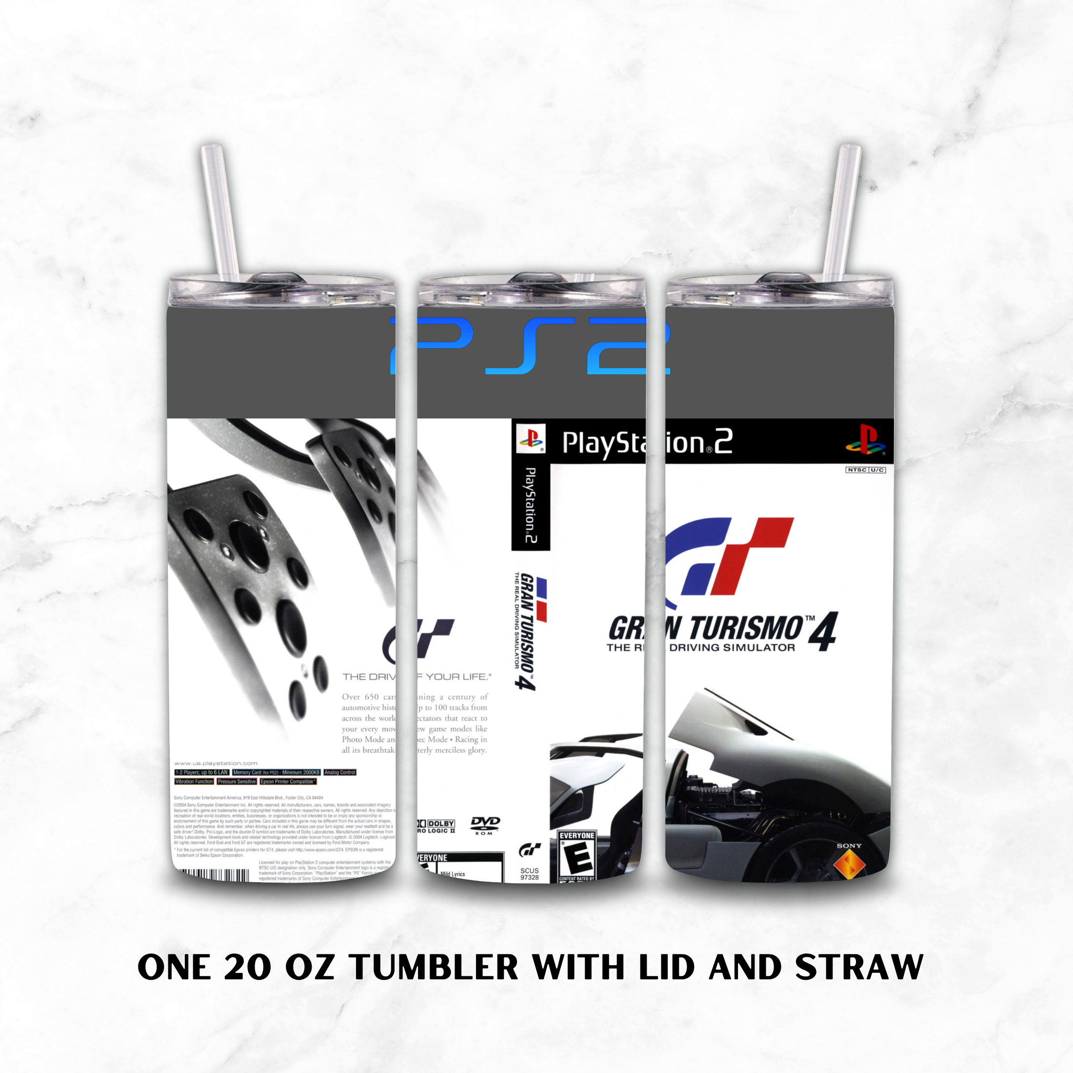 Three views of a 20 oz tumbler with lid and straw, featuring PlayStation 2 and Gran Turismo 4 graphics, displayed on a white marble background.