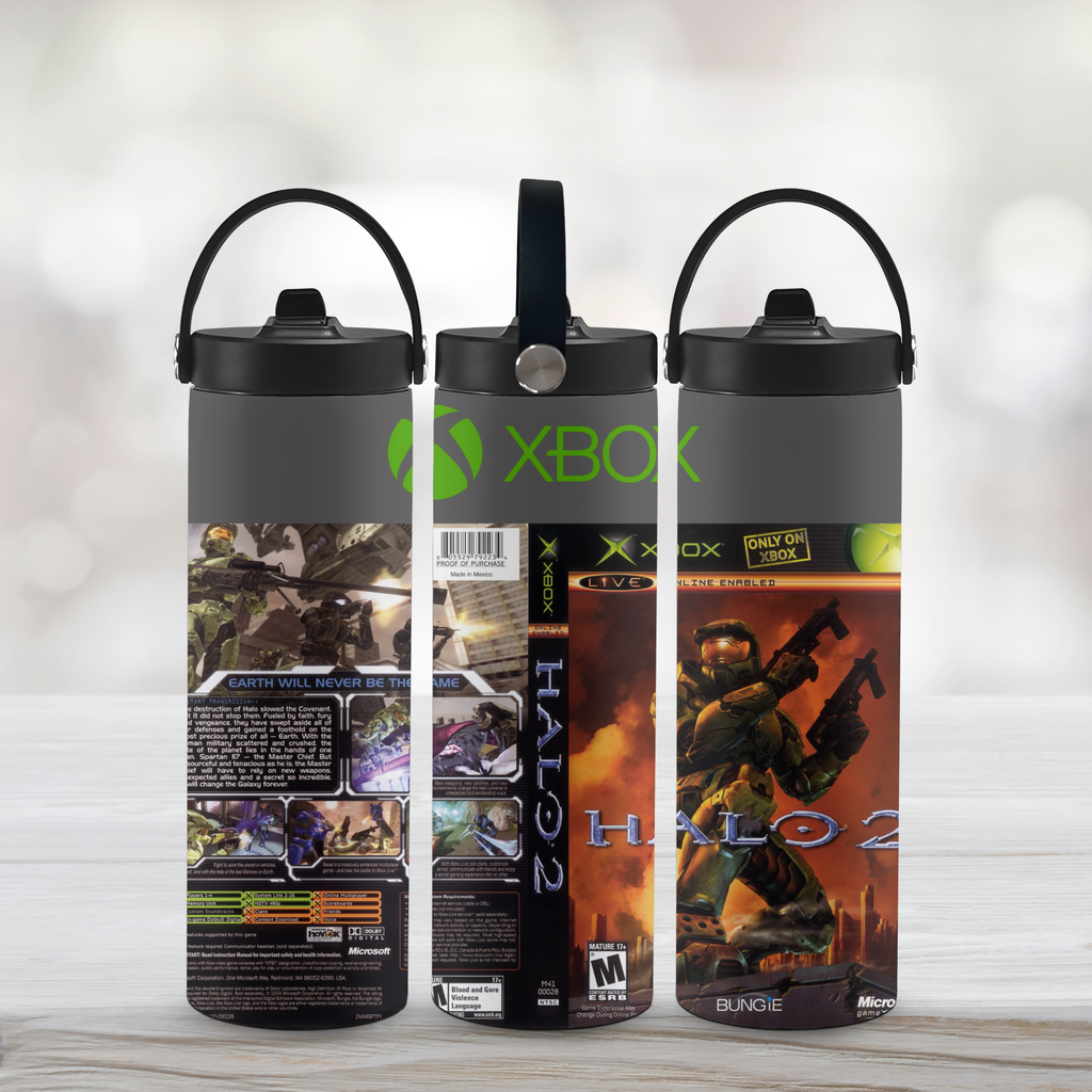 Three black water bottles with Xbox and Halo 2 branding on a light wooden surface.