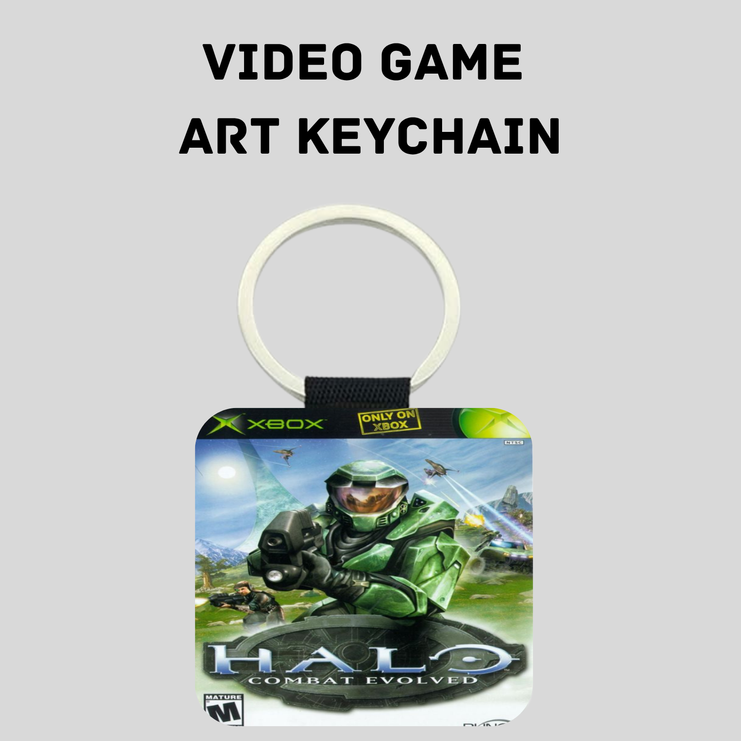 A Halo video game art keychain featuring artwork from Halo Combat Evolved on a square tag with a white key ring and black strap, shown on a light gray background with the text 'VIDEO GAME ART KEYCHAIN' above it.