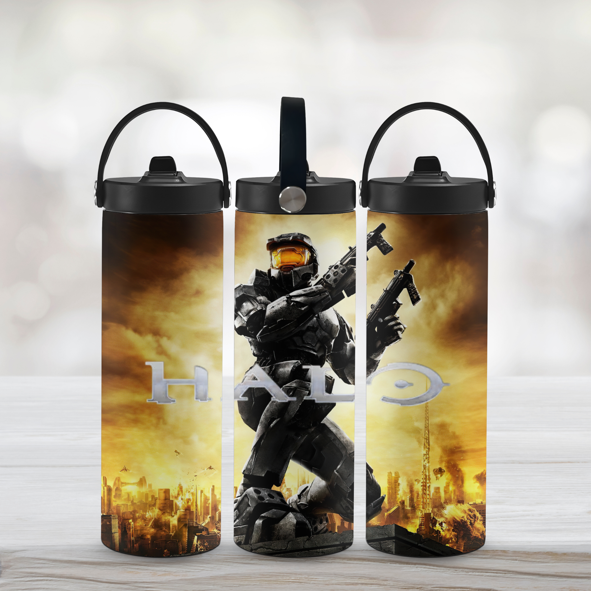 Three 'Halo' themed sports water bottles with a white background.