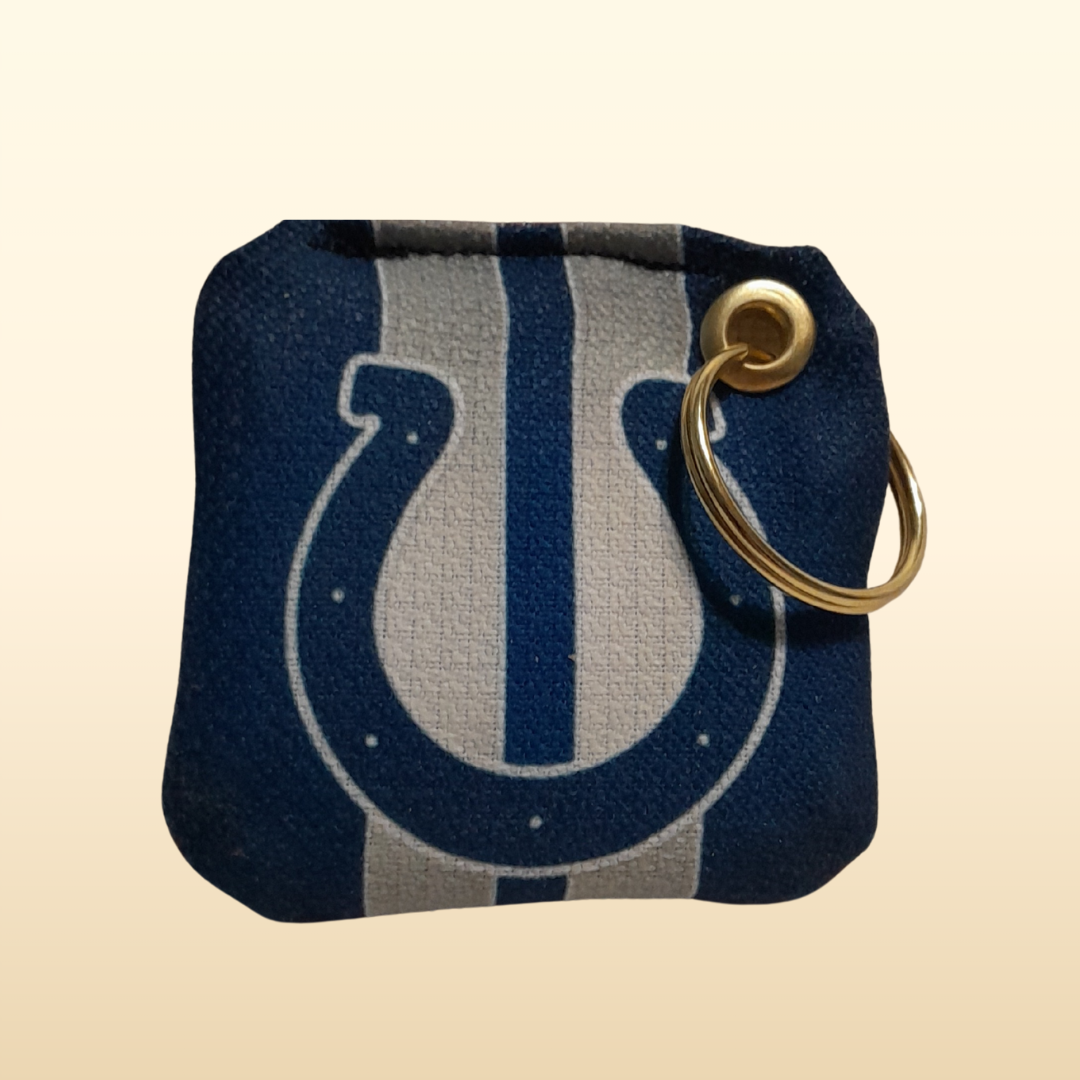 Keychain pouch with Indianapolis Colts logo on a beige background