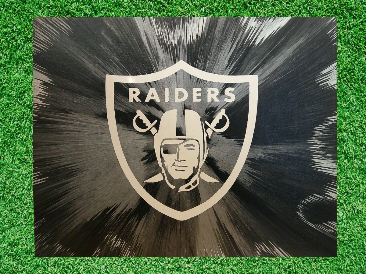 Las Vegas Raiders Football Spin Art on a green grass field