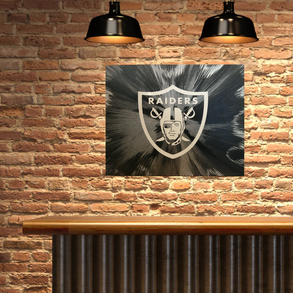 Las Vegas Raiders Spin Art on a brick wall background