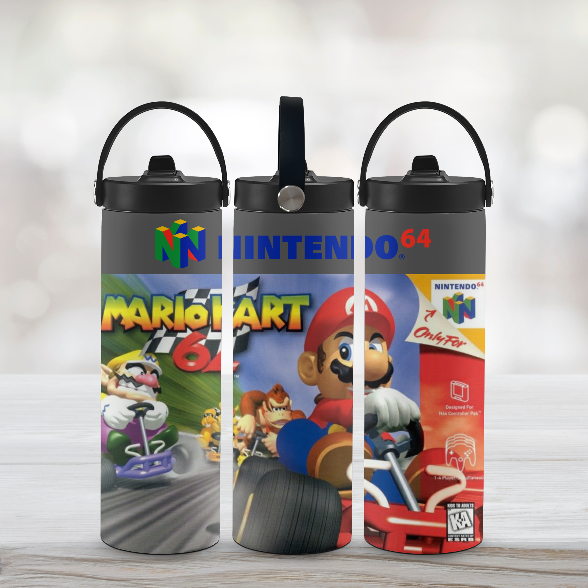Three sports water bottles with mario kart 64-themed designs on a light background
