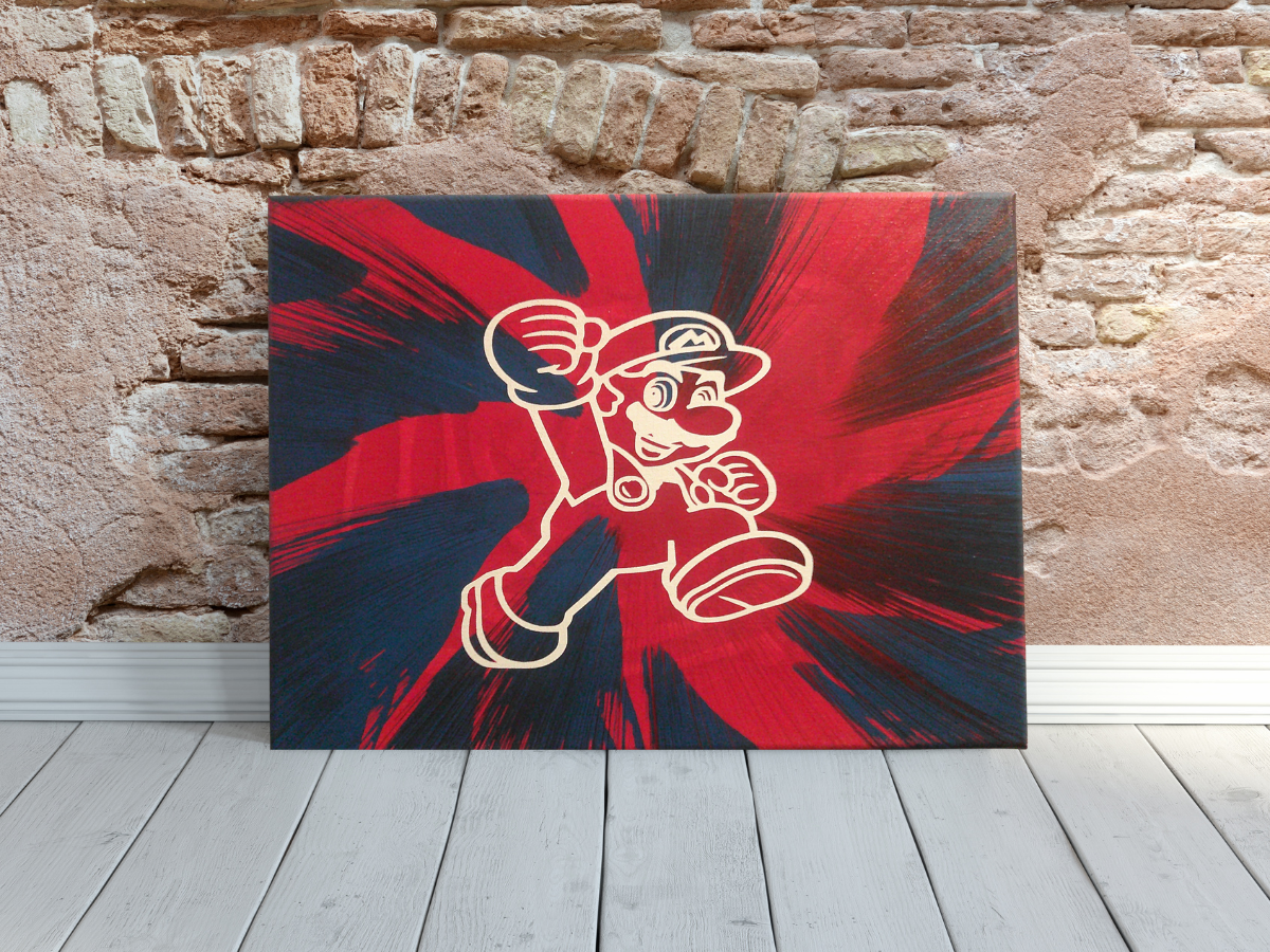 Super Mario Spin Art canvas wall art leaning against a brick wall.