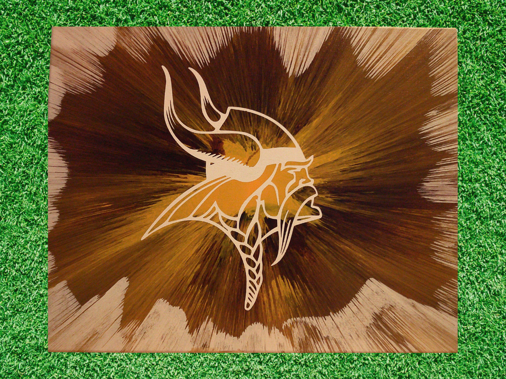 Custom Spin Art with Minnesota Vikings logo on a grass background