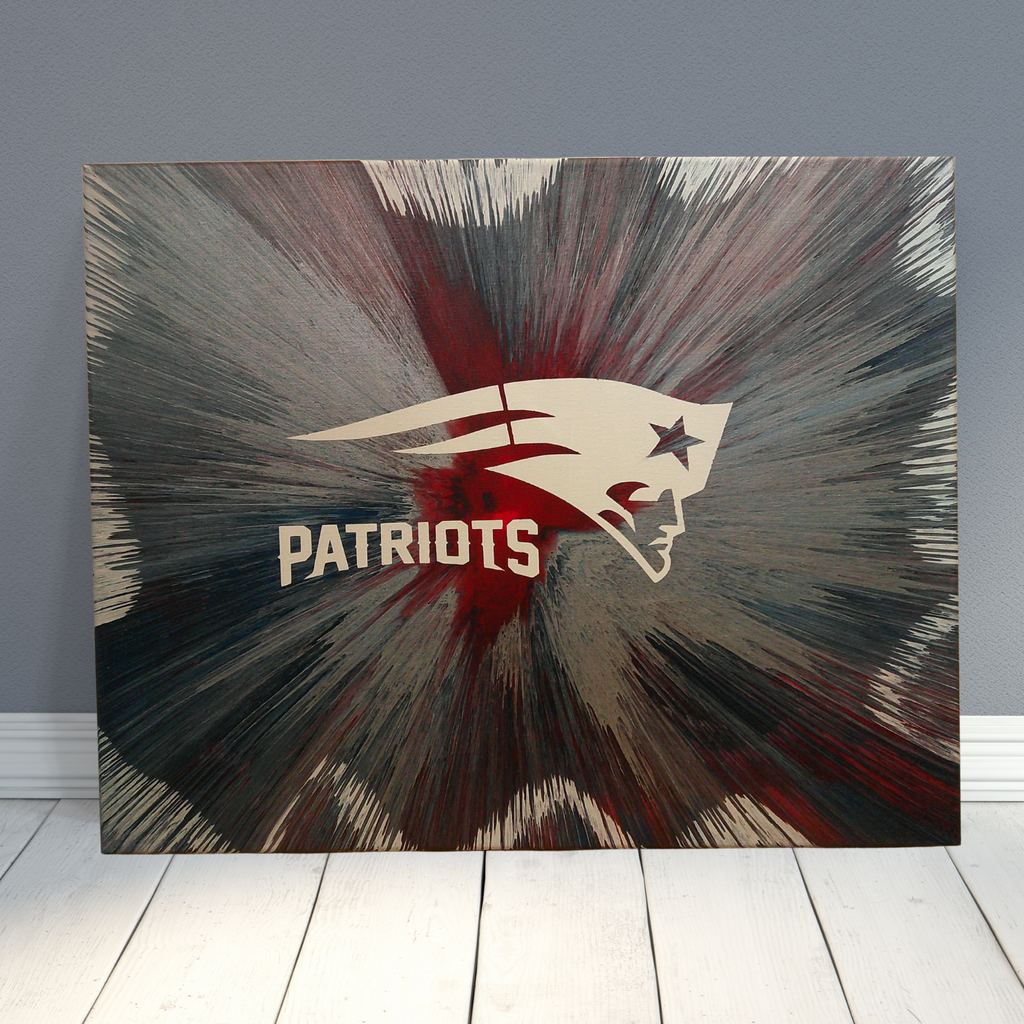 NE Patriots Spin Art canvas with vibrant team colors on a textured wall background