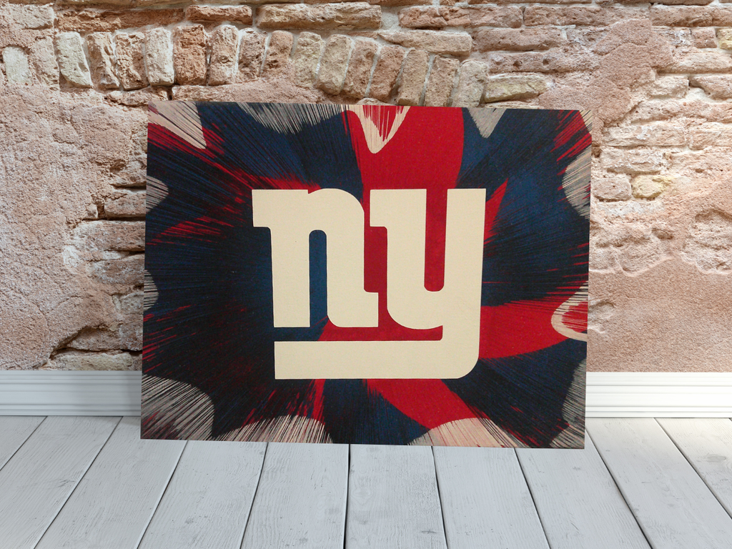 New York Giants Spin Art canvas wall art leaning on a brick wall. 
