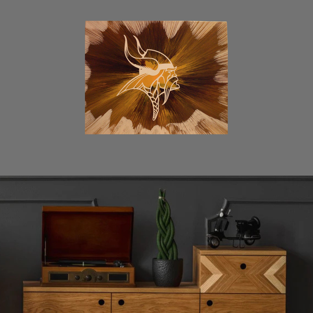 Minnesota Vikings Spin Art above a wooden cabinet with a record player and decor items.