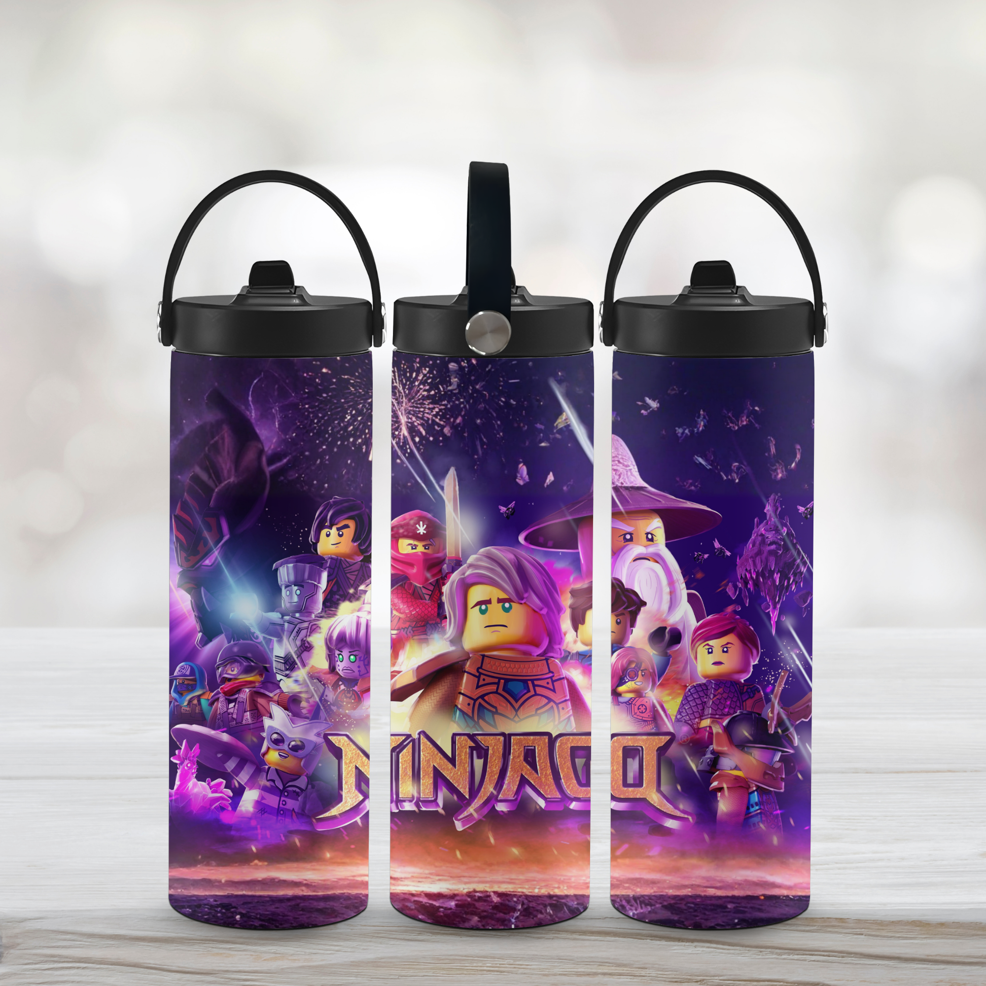Three sports water bottles with a LEGO Ninjago design on a light background