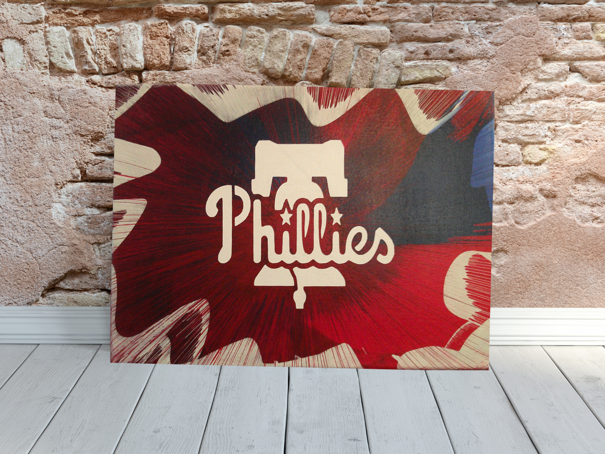 Philadelphia Phillies Spin Art canvas wall art against a brick wall background.