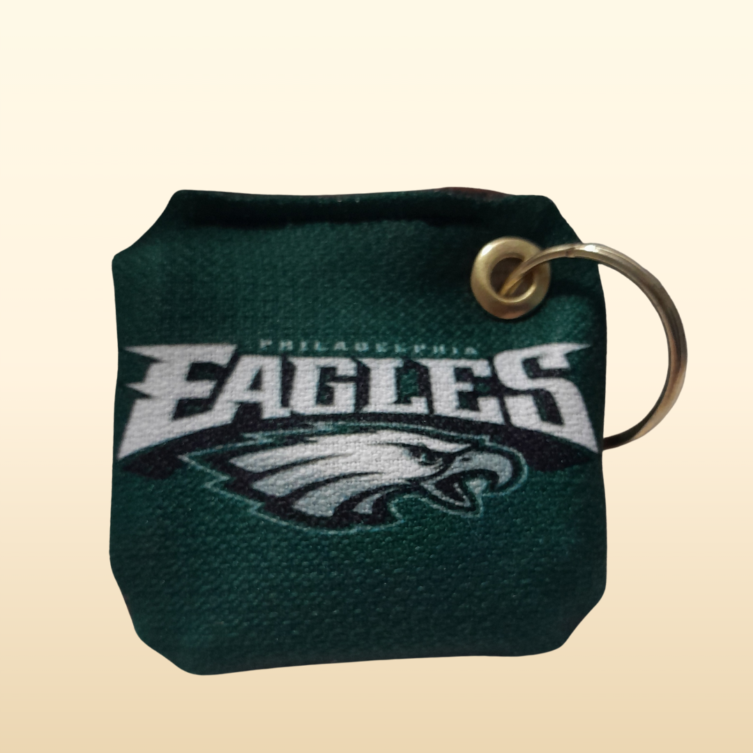 Philadelphia Eagles keychain on a beige background