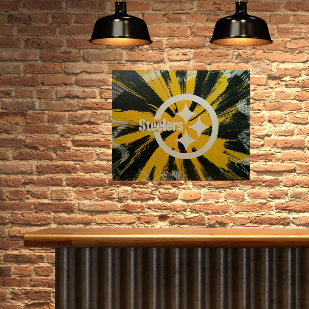 Pittsburgh Steelers Spin Art against a brick wall.