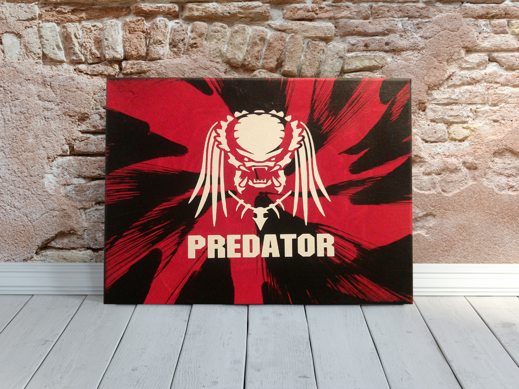 Predator Spin Art canvas wall art against a stone wall.