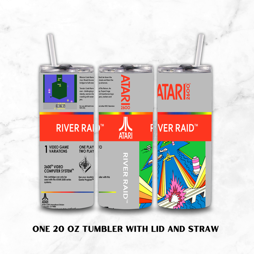 Three views of a 20 oz stainless steel tumbler with lid and straw, featuring retro Atari River Raid video game artwork on a light gray marble background. The tumbler design includes red, orange, green, blue, and gray sections with Atari branding.