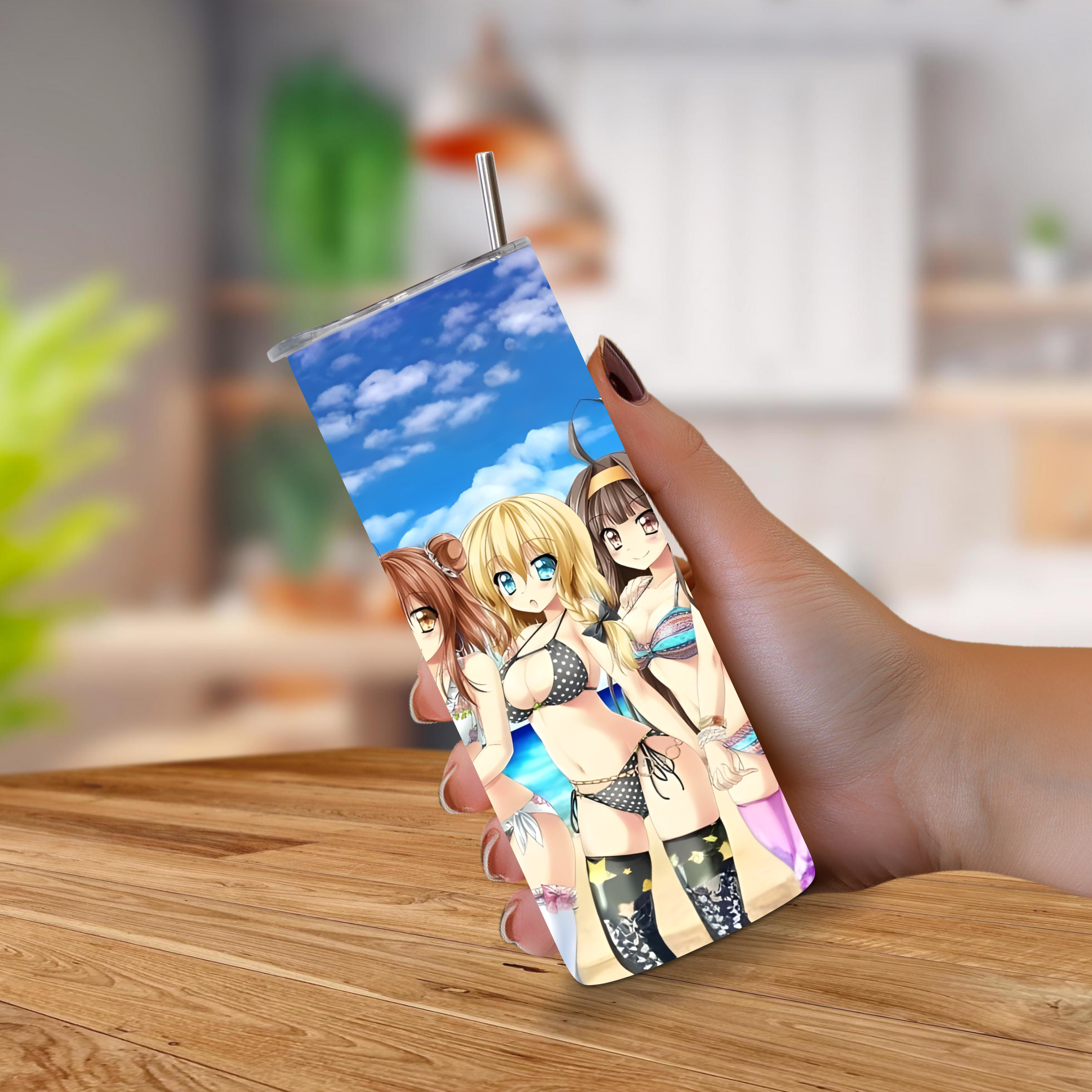 20oz tumbler with anime girl characters held by a hand on a wooden surface