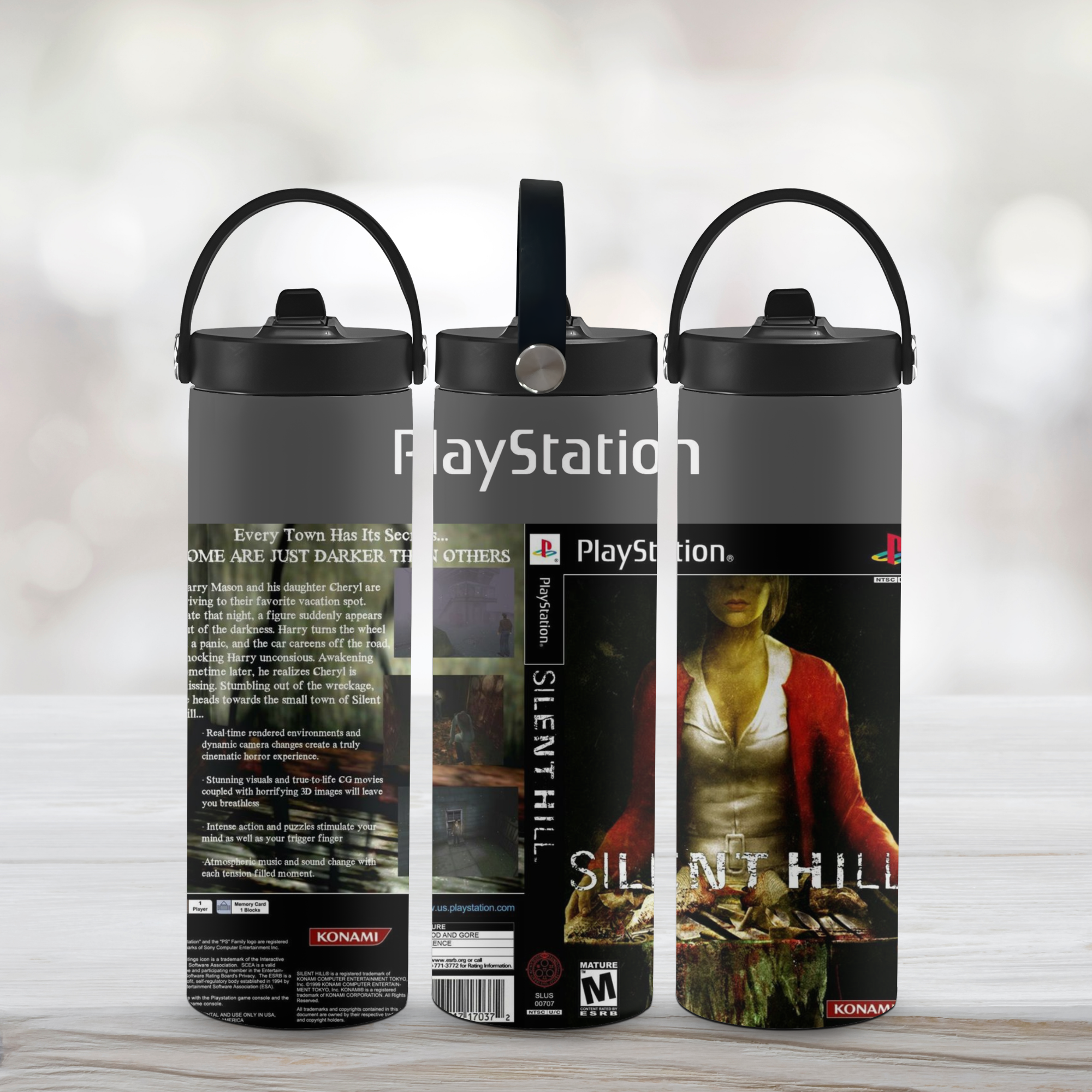 PlayStation 'Silent Hill' themed sports water bottles on a wooden surface with a blurred background.