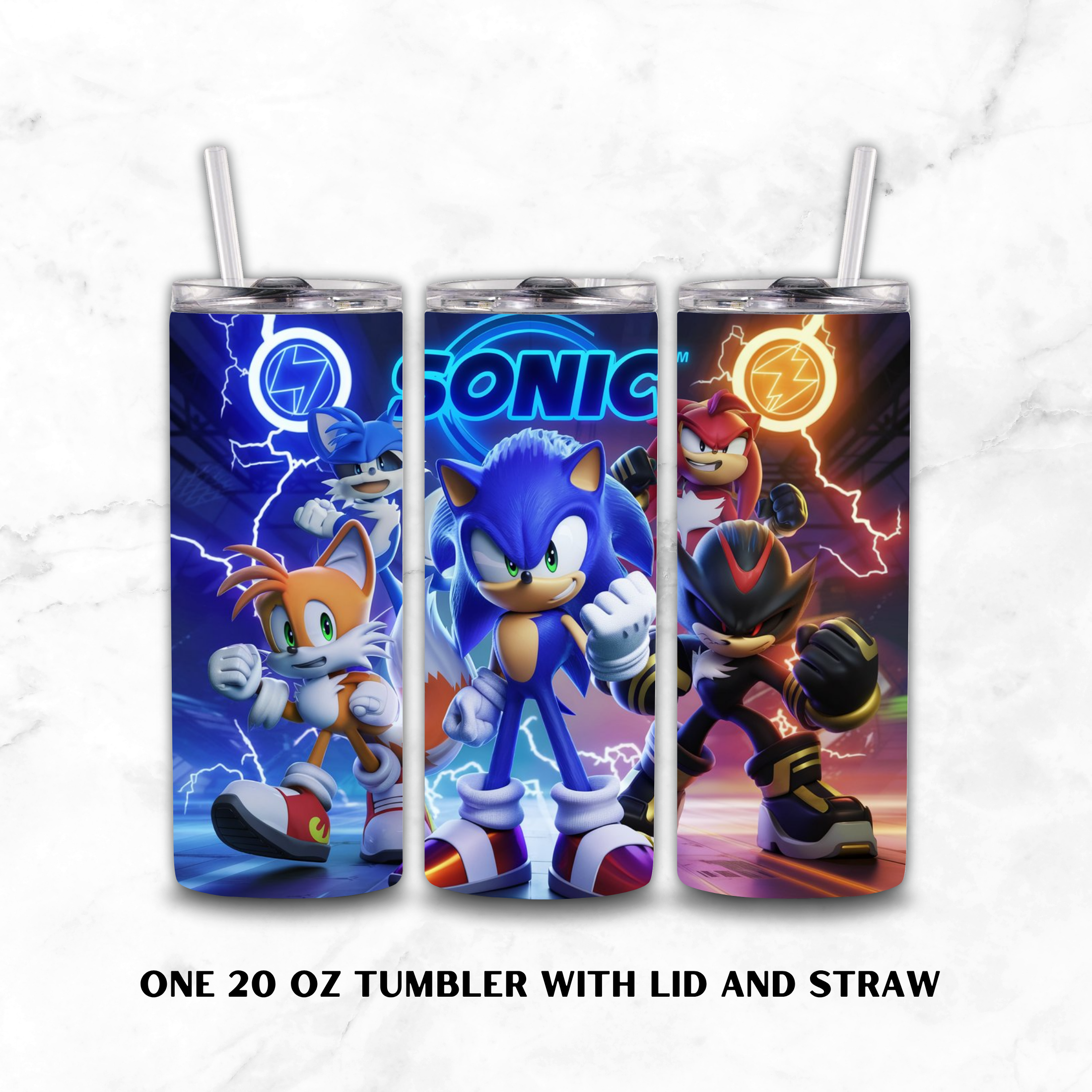Three 20 oz tumblers with lids and clear straws, each printed with a different Sonic the Hedgehog character design: Tails, Sonic, and Knuckles. The tumblers are shown on a light marble background with the text 'ONE 20 OZ TUMBLER WITH LID AND STRAW' below.