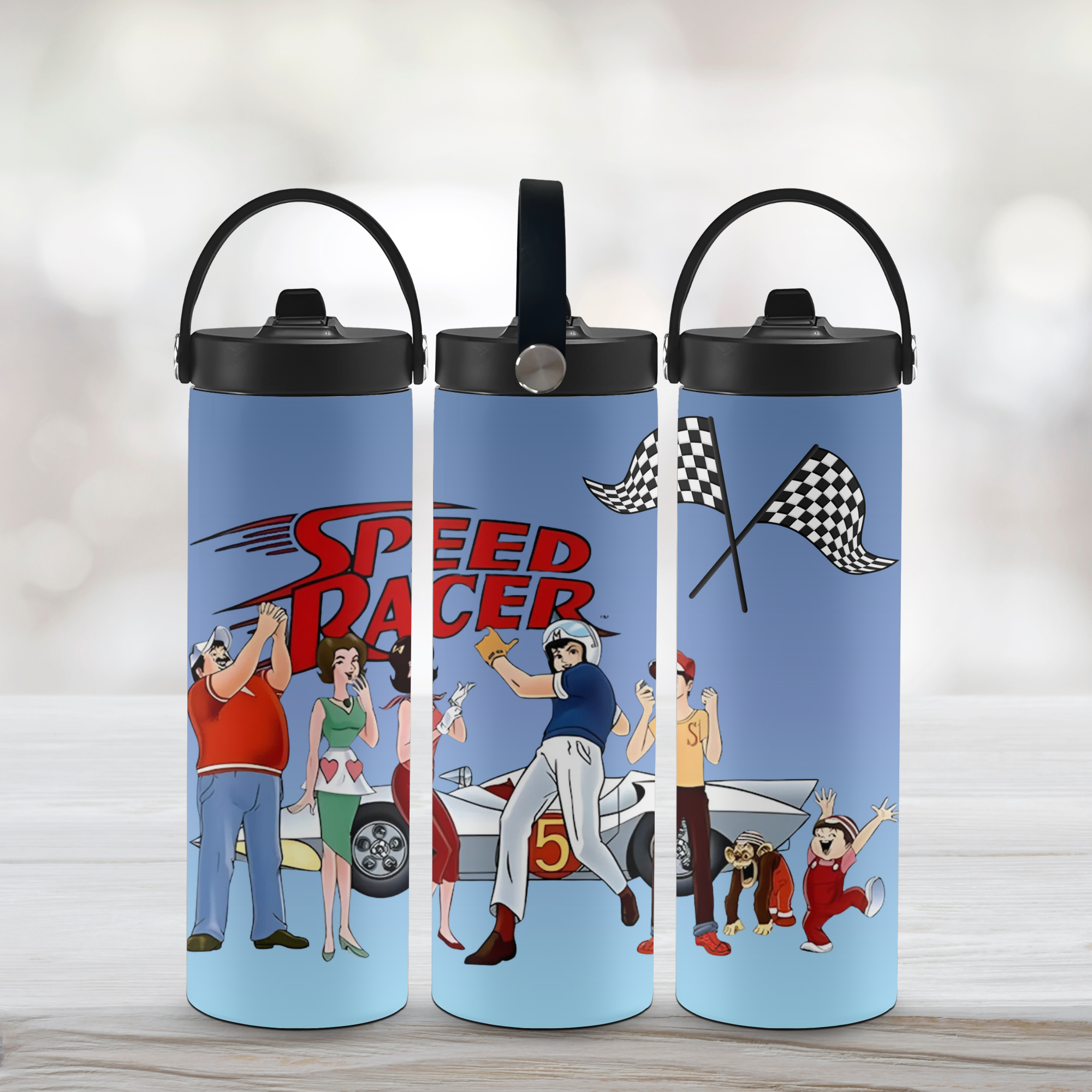 Three insulated water bottles with black lids and carry handles, shown side by side on a light surface. The bottles have a light blue background with a colorful cartoon speed racer graphic featuring a race car, checkered flags, and people.