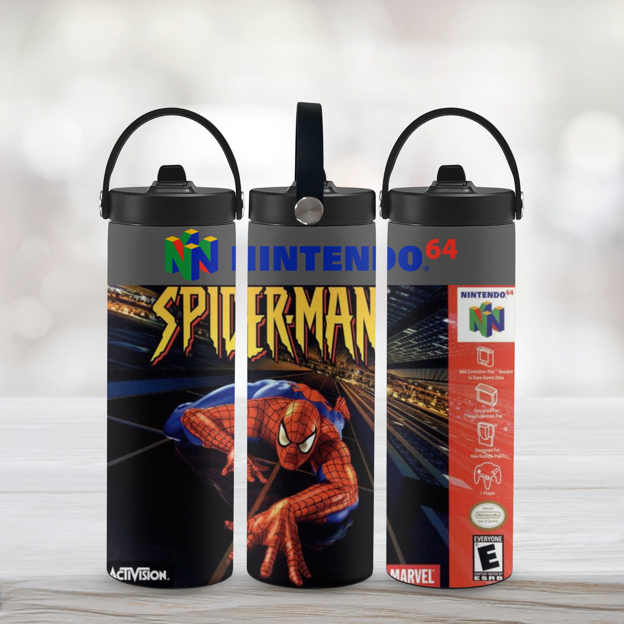 Three water bottles with Spider-Man and Nintendo 64 branding on a light background