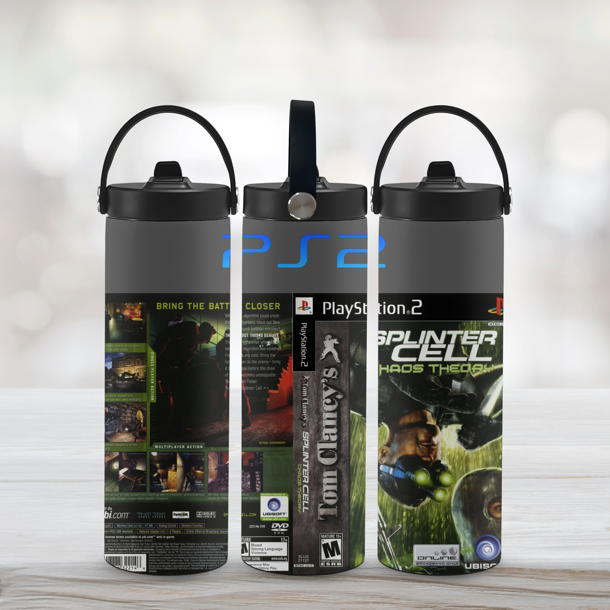 Three sports water bottle with splinter cell game covers on a light background