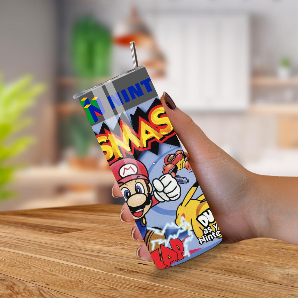 Hand holding a colorful tumbler of Super Smash Bros with a character design on a wooden surface.