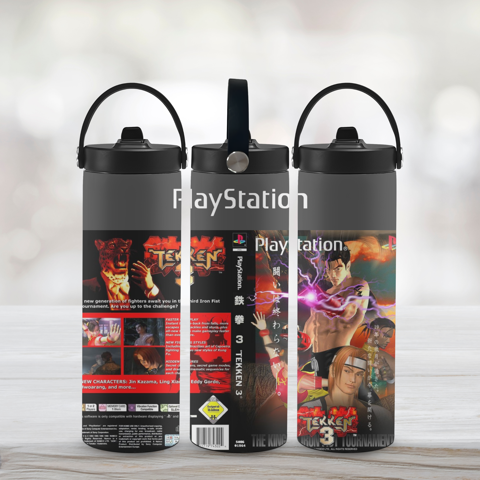 Three PlayStation water bottles with Tekken 3 design on a light background