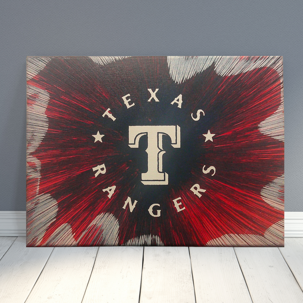 Texas Rangers Spin Art canvas leaning on a grey wall background. 