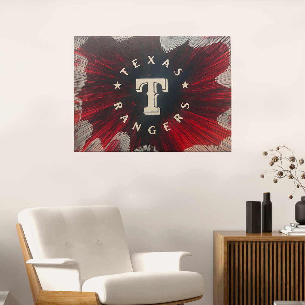 Texas Rangers Spin Art on a wall above a white chair and wooden cabinet.