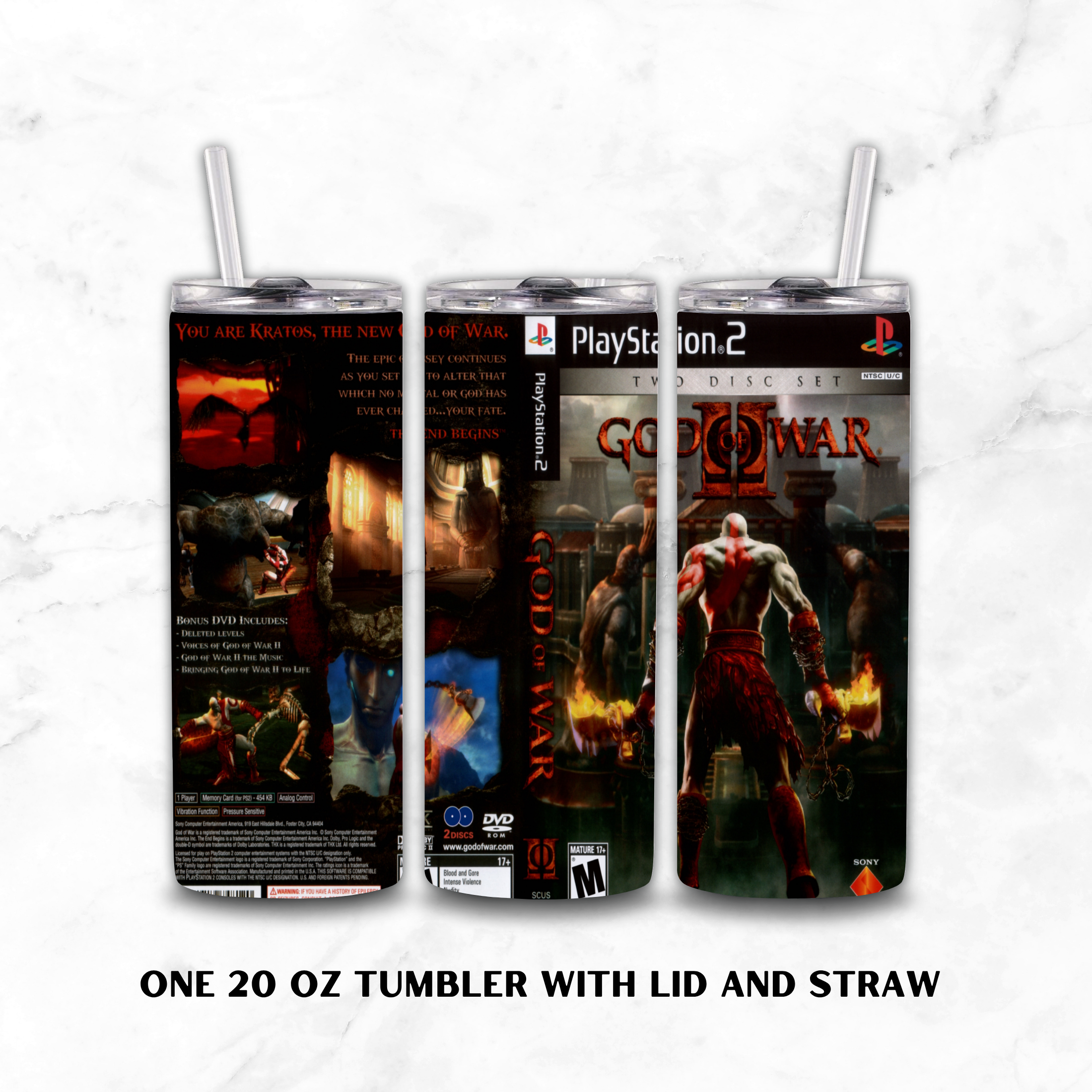 Three views of a 20 oz tumbler with lid and straw, wrapped in a God of War II PlayStation 2 themed wrap, shown on a white marble background with text reading 'ONE 20 OZ TUMBLER WITH LID AND STRAW'.