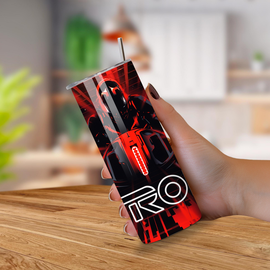 Person holding a Tron tumbler on a wooden surface