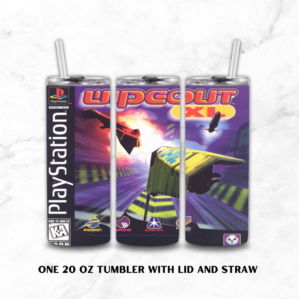 Three views of a 20 oz skinny tumbler with lid and straw, featuring a custom wrap design for the video game 'Wipeout XL'. The design includes the PlayStation logo, ESRB rating, and various publisher logos at the bottom, set against a white marble background with black text reading 'ONE 20 OZ TUMBLER WITH LID AND STRAW'.