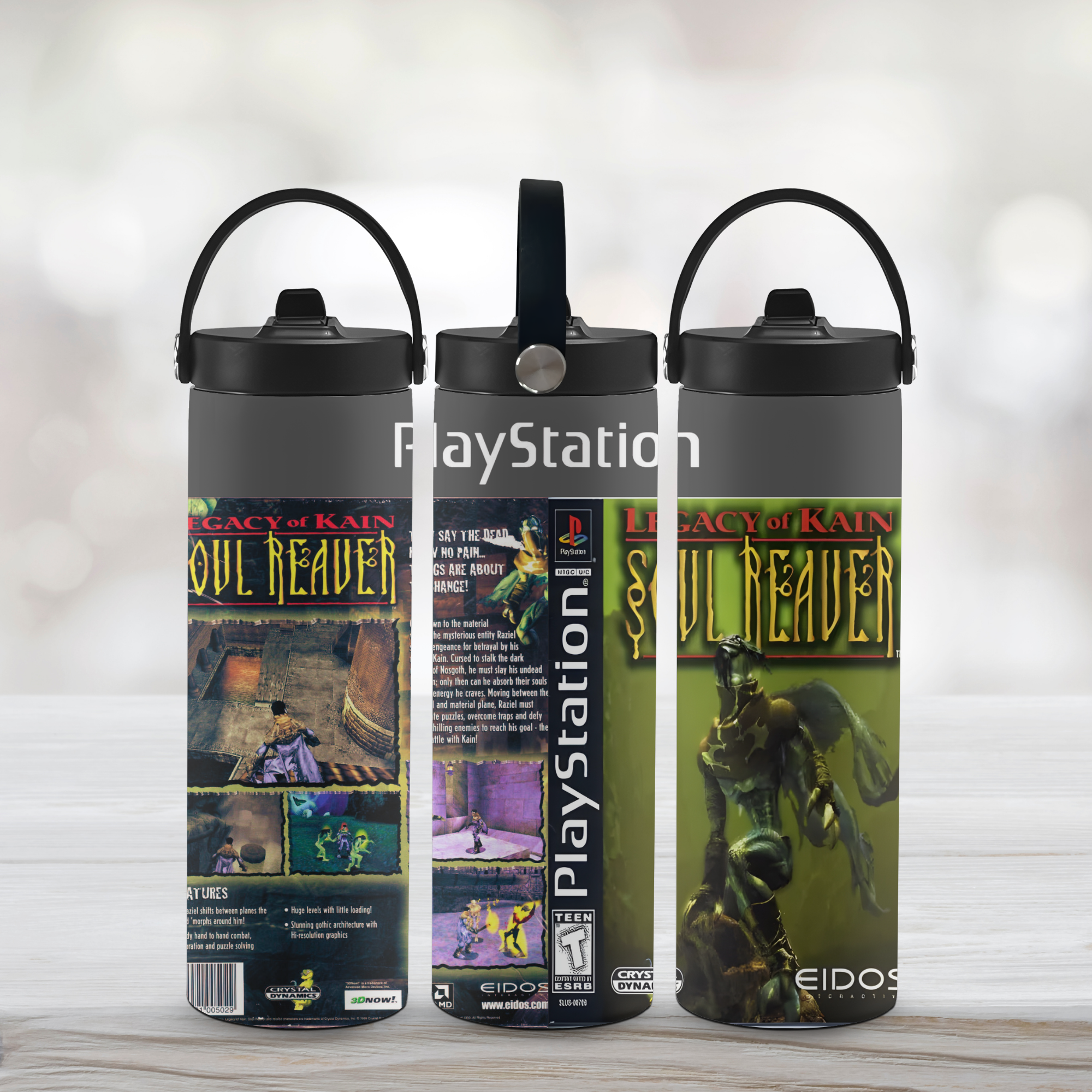 Three PlayStation-themed water bottles with 'Soul Reaver' graphics on a light wooden surface.